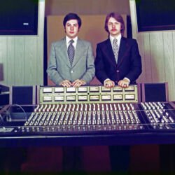 Opening day of the original Studio A in March 1973. Mike and Gary spent so much money on the Auditronics console that they had nothing but cheap double-knit suits to wear for the photo.